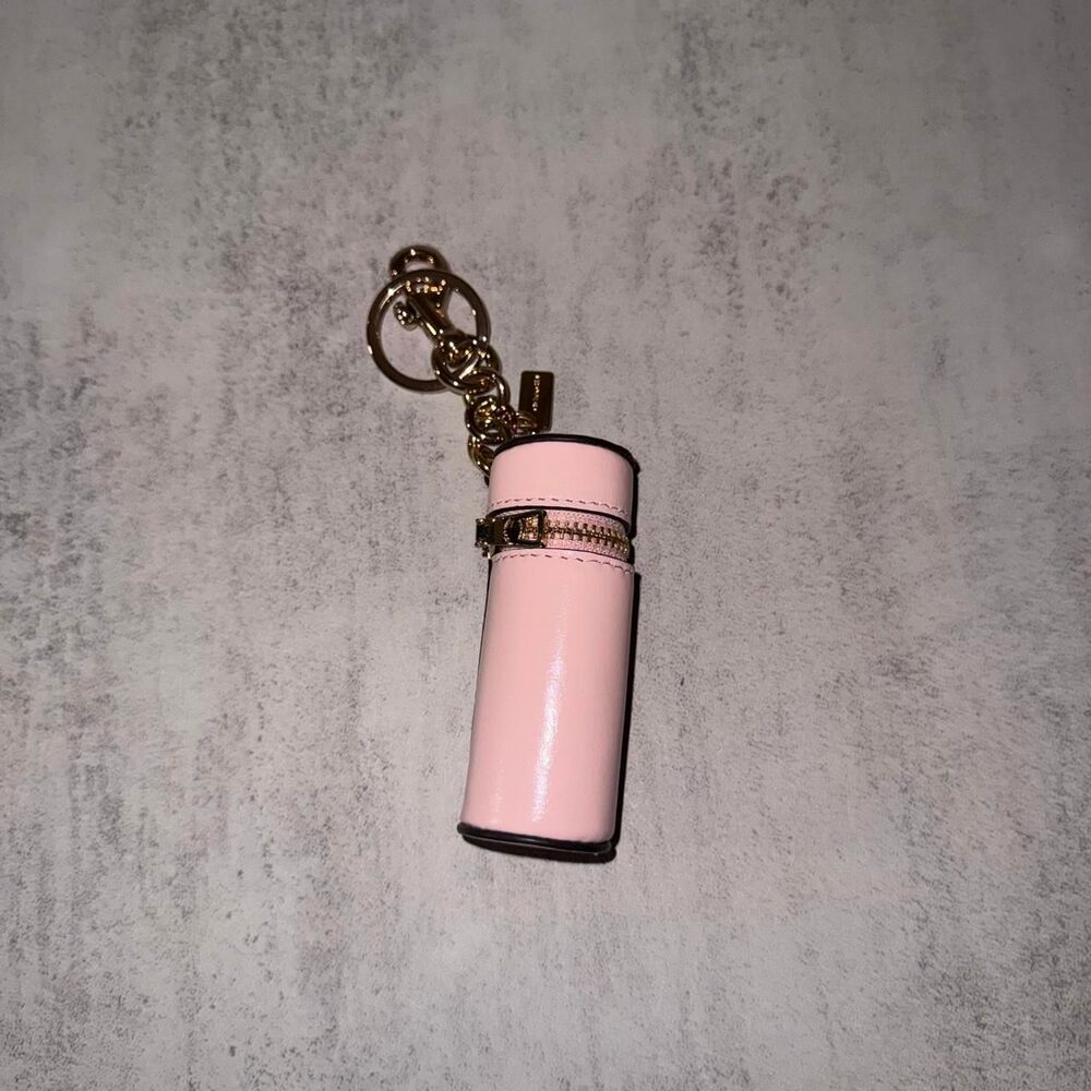 Coach pink lipstick case